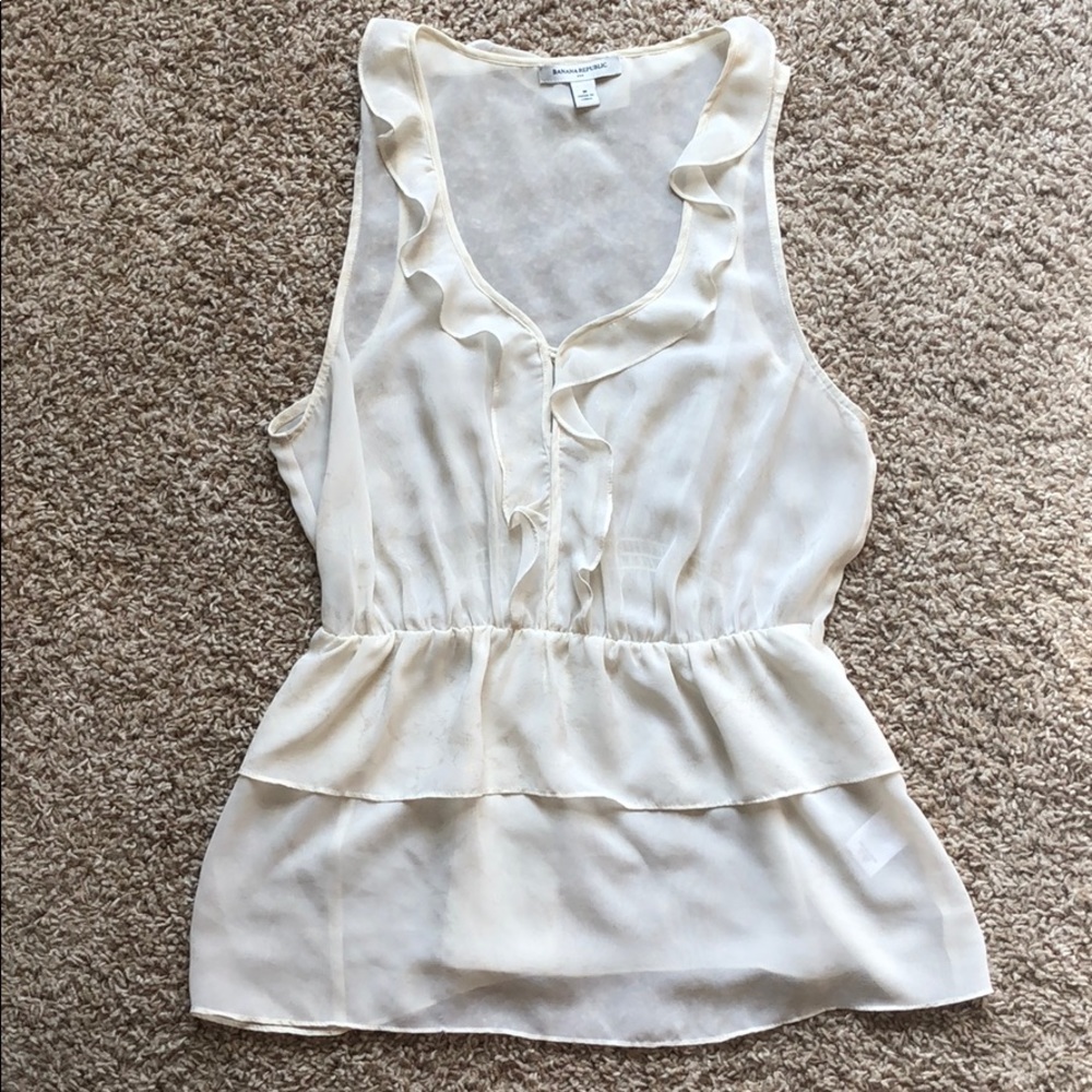 Cream sleeveless flutter top